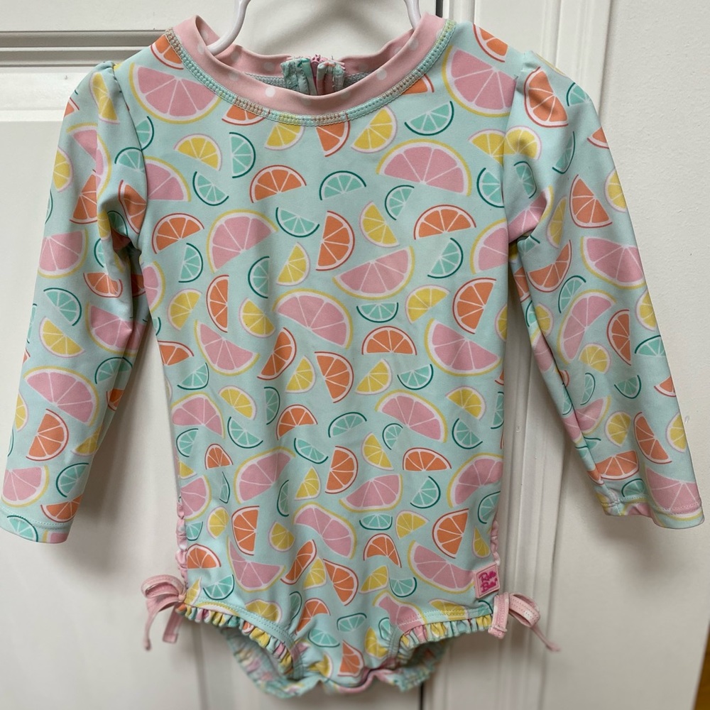 RuffleButts® Girls One Piece Rash Guard Toddler Swimsuit UPF 50+ Sun Protection